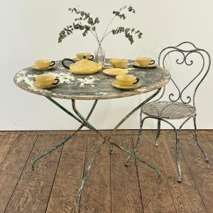 Table de jardin en fer forgé riveté XIXe