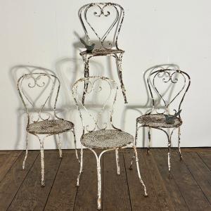 4 chaises de jardin en fer forgé riveté