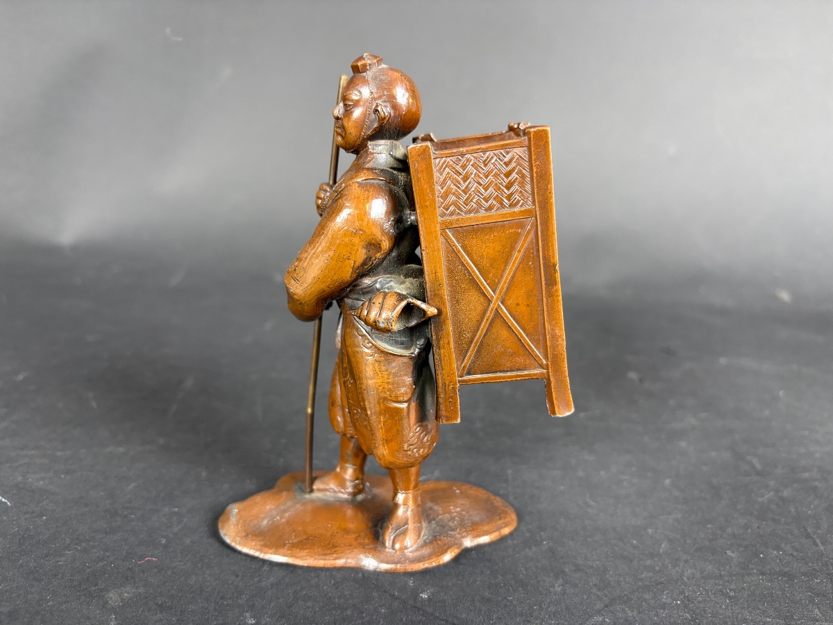 Japanese Bronze Okimono — A Pilgrim Traveler With A Conch Shell-photo-2