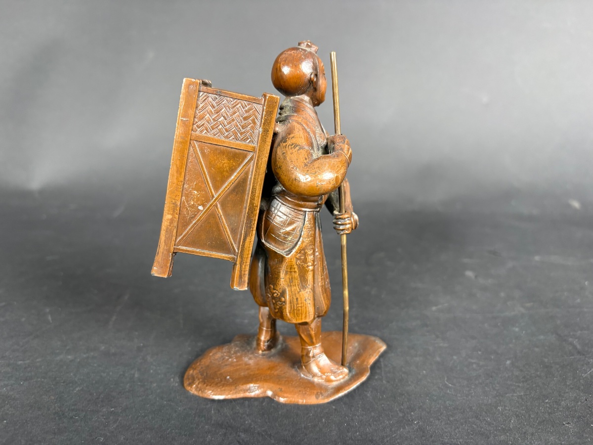 Japanese Bronze Okimono — A Pilgrim Traveler With A Conch Shell-photo-4