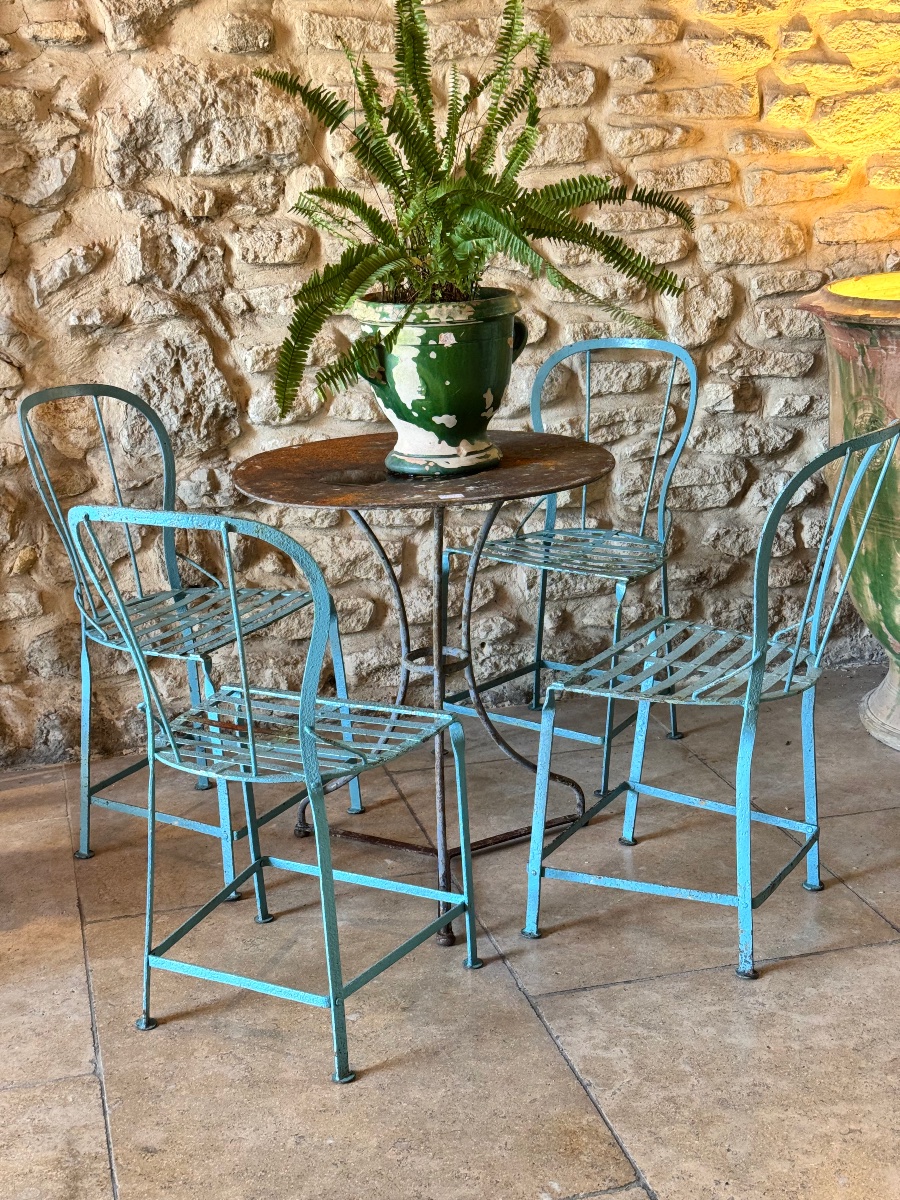 Four Chairs And A Garden Pedestal Table Made Of Riveted Iron – Early 20th Century