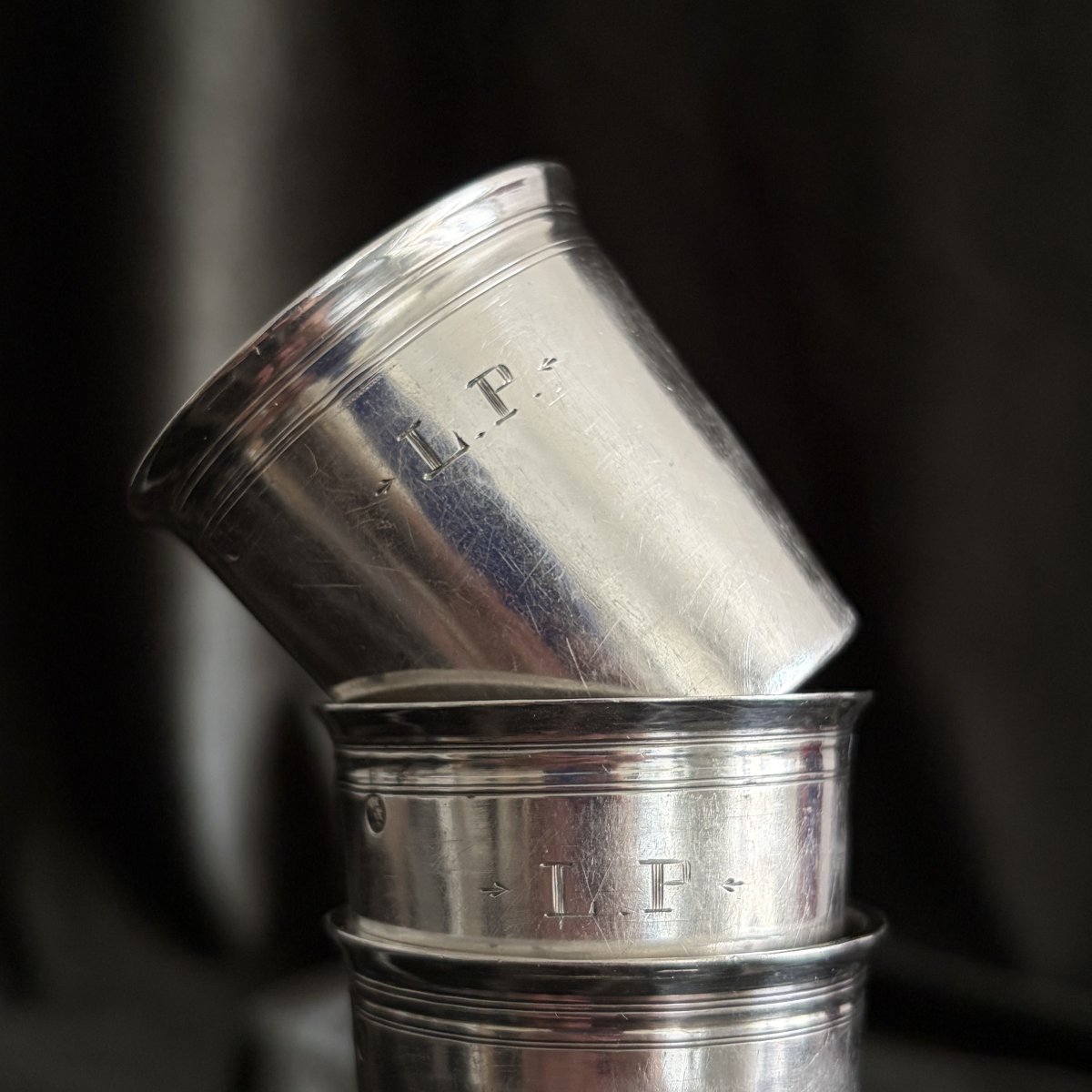 Six timbales monogrammées "L.P." en argent par Louis Tassin, époque Empire