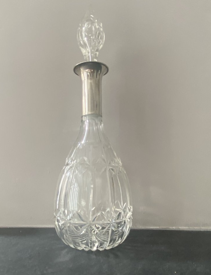 Large Crystal Carafe With A Silver Spout