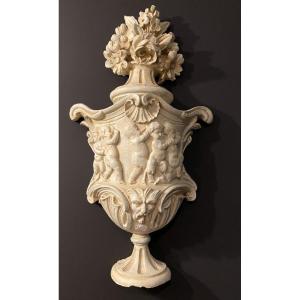 pot fleuri en plâtre