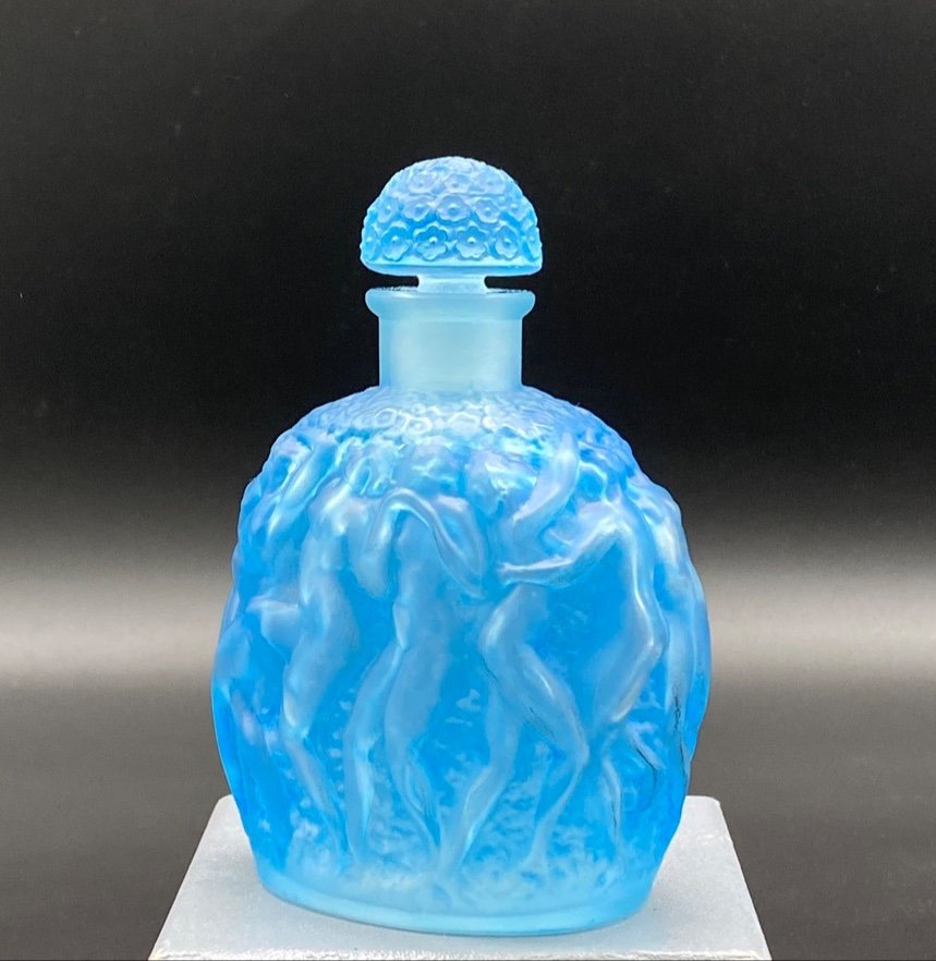 A Calendal Bottle By R.lalique