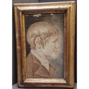 Dessin de garçon (début du XIXe siècle) – Cadre ancien du XVIIe siècle