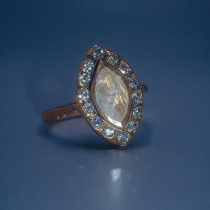 18 K Gold Ring Set In Its Center With A Rose Cut Diamond