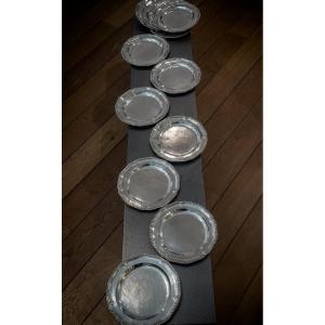 Suite Of Twelve Plates In Sterling Silver