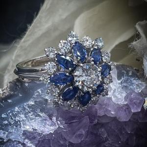 Vintage Ring From The 1970s 18 K White Gold Set With Diamonds And Sapphires.