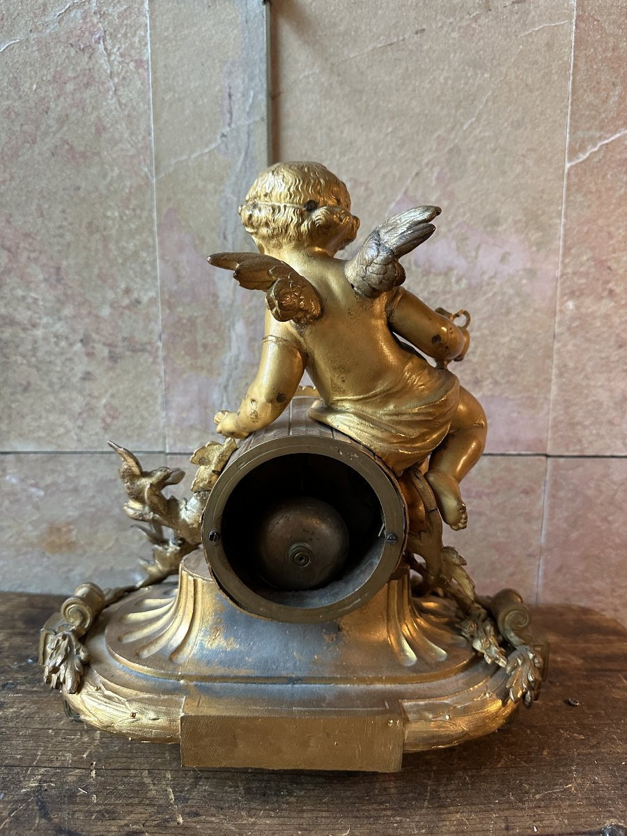 Pendule d’angelot, en régule dorée, datant du XIX siècle-photo-4