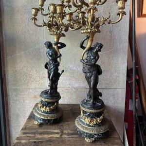 Paire de chandeliers en bronze et bronze doré. Napoléon III.