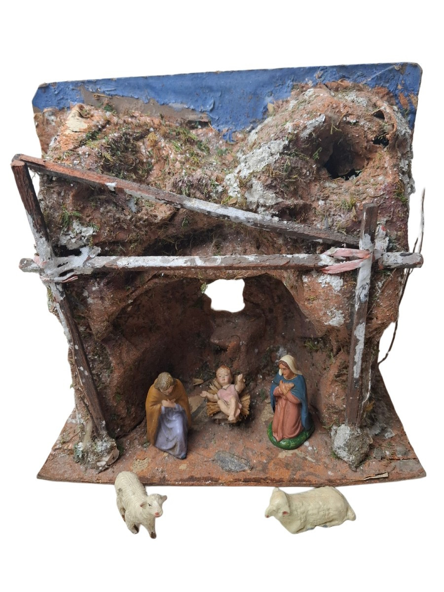 Nativity Scenes From Marolin. Joseph And Mary With The Infant Jesus And Two Sheep In A Cave