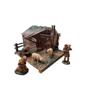 Nativity Scene With Jesus And Mary, Shepherd With Two Sheep Near A House