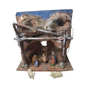 Nativity Scenes From Marolin. Joseph And Mary With The Infant Jesus And Two Sheep In A Cave
