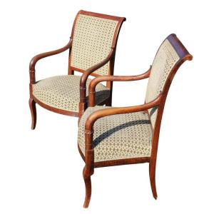 PAIR DE FAUTEUILS EN NOYER D'EPOQUE RESTAURATION, VERS 1830.