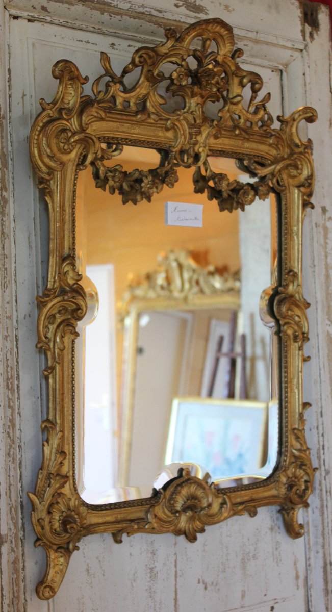 58 x 80 cm  miroir Napoléon III, feuille d'or, glace biseautée au mercure