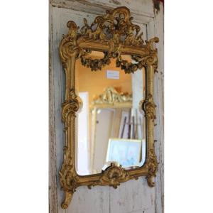 58 x 80 cm  miroir Napoléon III, feuille d'or, glace biseautée au mercure