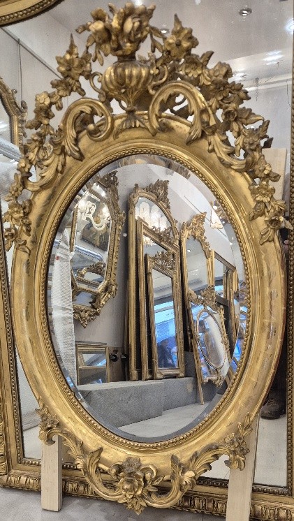 Miroir ovale Louis Philippe feuilles d'or  85*135cm