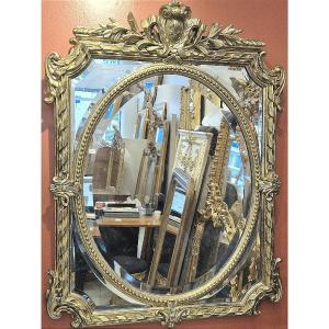 Miroir Napoleon III doré glace biseautée 86*112 cm