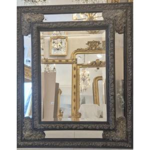 Miroir Napoléon III laiton et bois laqué noir 87*108cm