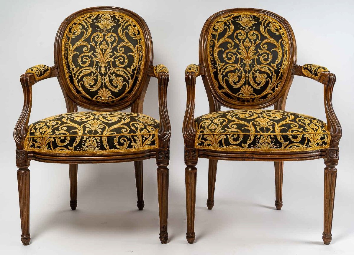 Pair Of Louis XVI Style Armchairs With Medallion Backs In Carved And Waxed Molded Natural Wood