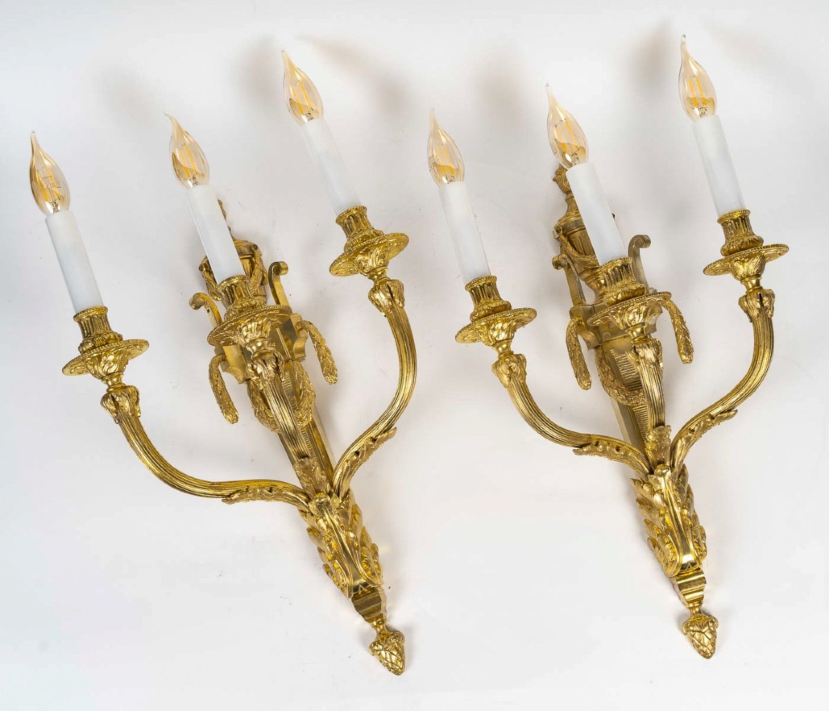 Pair Of Louis XVI-style Three-light Sconces In Chiseled And Gilt Bronze Circa 1880