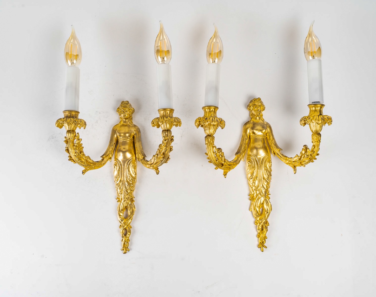 Pair Of Louis XVI Style Wall Sconces Aux Termes De Femmes In Chiseled And Gilded Bronze, Circa 