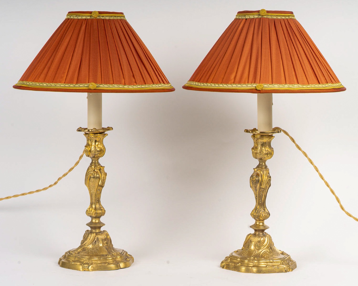 A Pair Of Rocaille-style Gilt Bronze Flambeaux, Mounted As Lamps, Palais Ducal De Nevers 1820