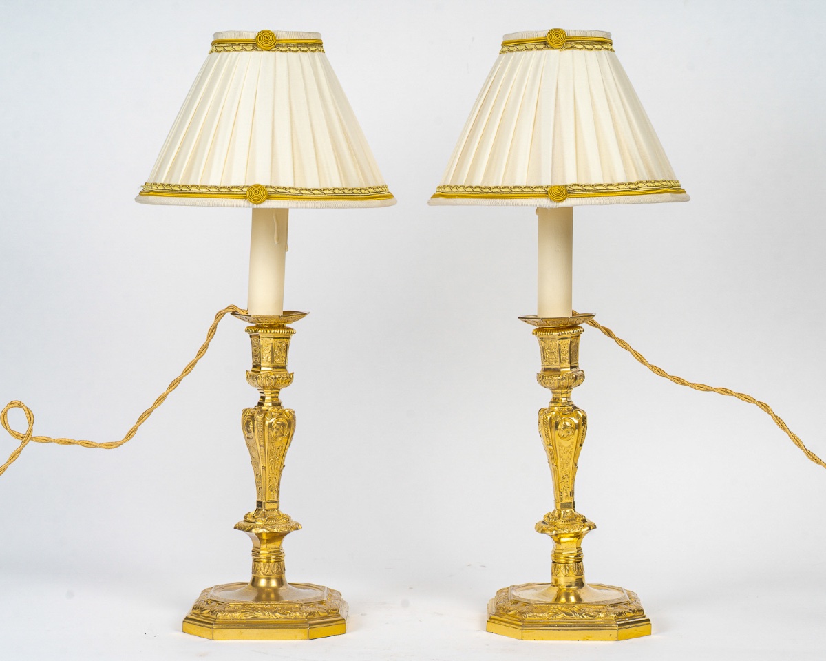 Pair Of French Regence-style Chiseled Gilt Bronze Candlesticks In The Manner Of Jean Berain
