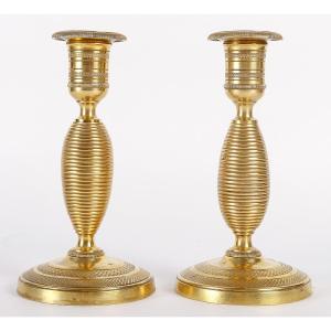 Pair Of Small Chiseled And Gilt Bronze "ragot" Candlesticks, Empire Period Circa 1810
