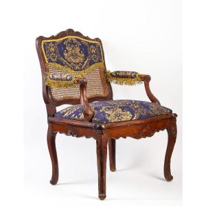 French Regence Period Molded And Carved Wood Cane-back Armchair Circa 1720