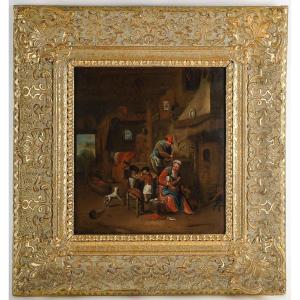 École belge du XIXe siècle – La famille dans son intérieur, huile sur panneau monogrammée GVH