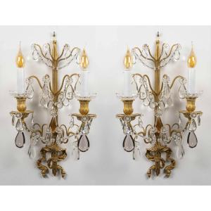 Paire d'appliques en bronze doré et cristal à décor de nœuds de rubans, style Louis XVI