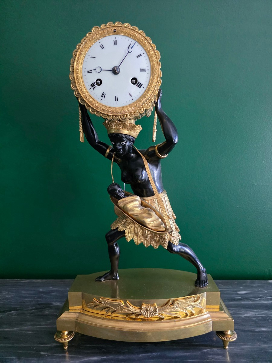 Pendule au bon sauvage : "La Nourrice Africaine". Époque Empire.
