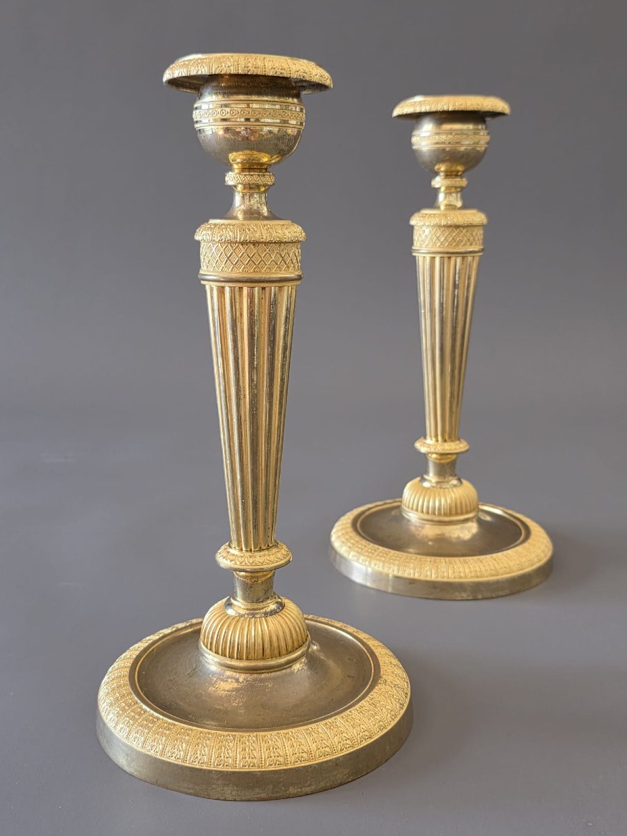 Pair Of Gilded Bronze Candlesticks From The Directoire-consulate Period. Late 18th Century. 