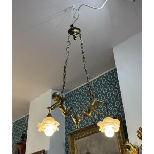 Ancien lustre à décor de putti et d'anges vers 1900 2 feux art nouveau