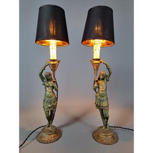 Pair Of Lamps Depicting Female Subjects In The Egyptian Style.