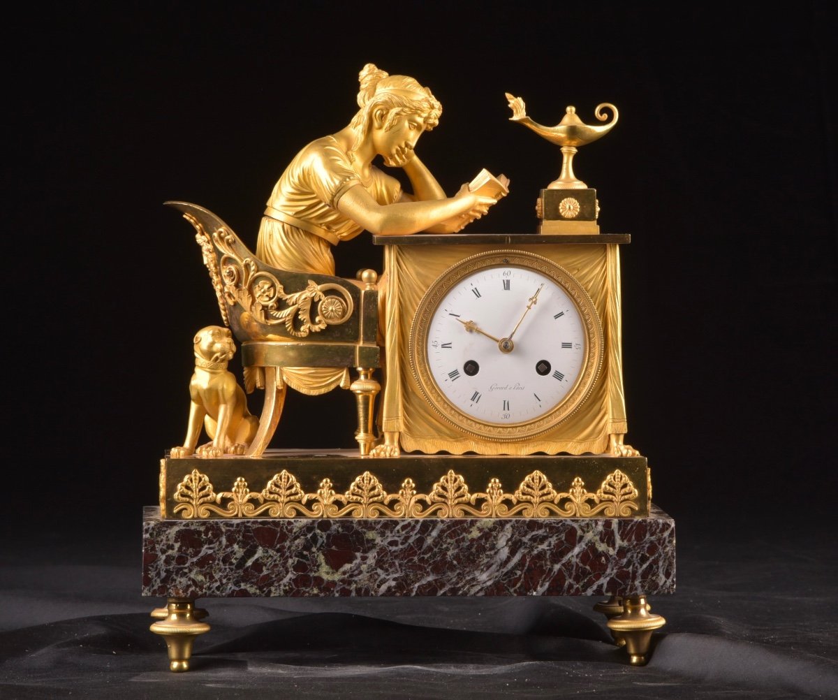 La Lectura, A French Empire Mantel Clock In Gilded Bronze, Ca. 1800