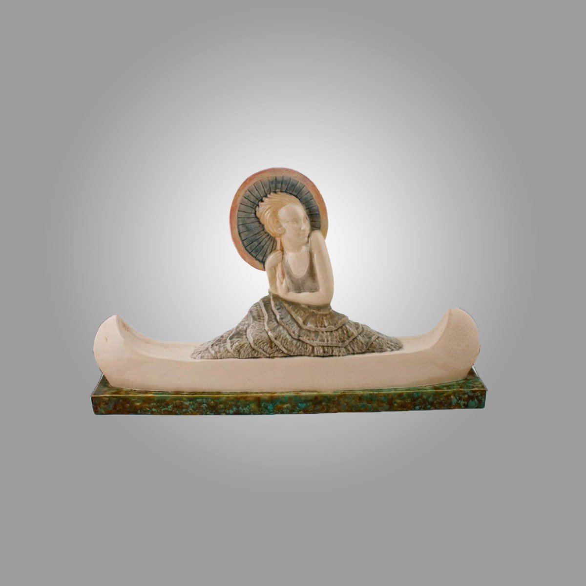Simard Marie-louise.  “canotage”. Sculpture Art Déco. Faïence émaillée Polychrome.  Vers 1930.