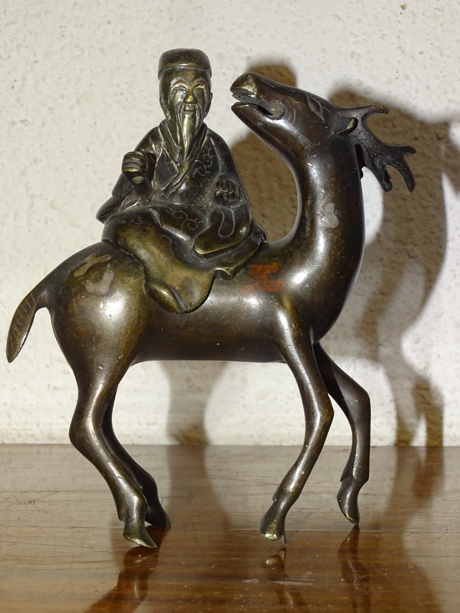 encensoir chinois en bronze en deux parties représentant « Shoulao et le cerf ». XVIIIème