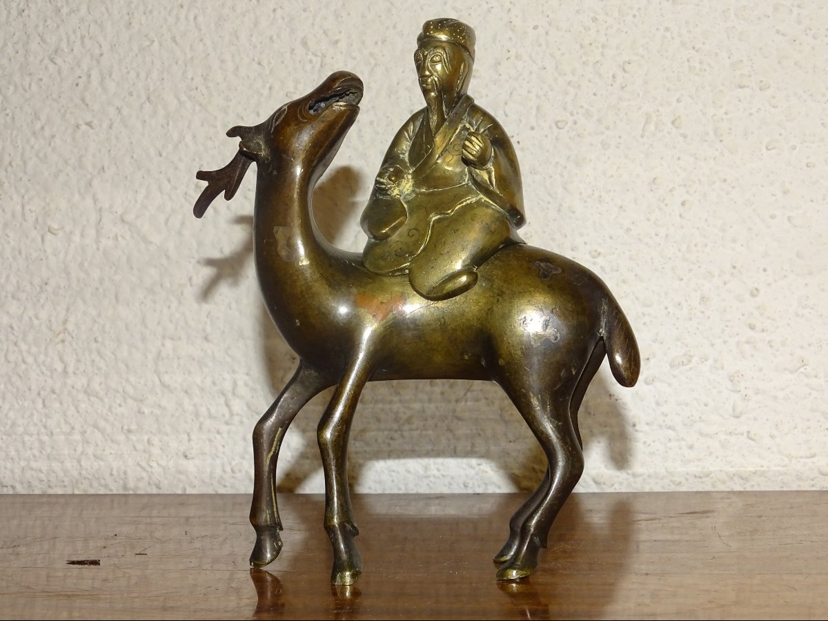 encensoir chinois en bronze en deux parties représentant « Shoulao et le cerf ». XVIIIème