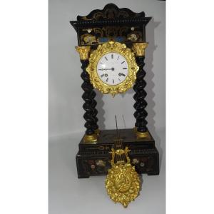 Pendule portique époque Empire / Charles X, Bronze et marqueterie, signé PICKARD