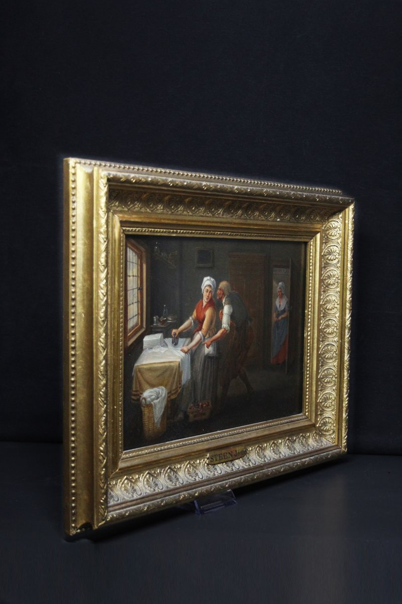 École flamande, Intérieur avec une femme repassant-photo-2