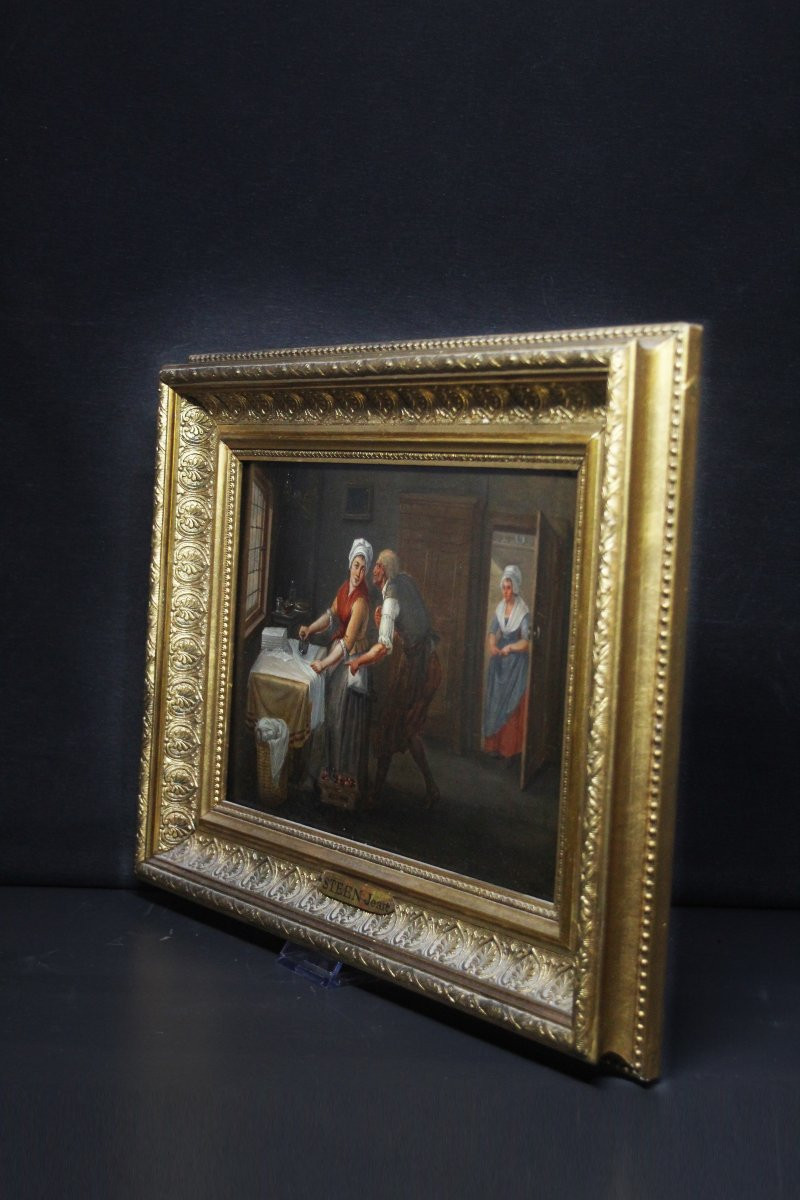 École flamande, Intérieur avec une femme repassant-photo-3