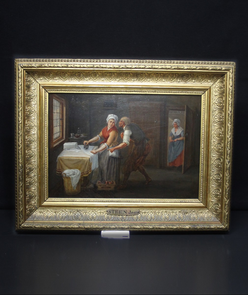 École flamande, Intérieur avec une femme repassant