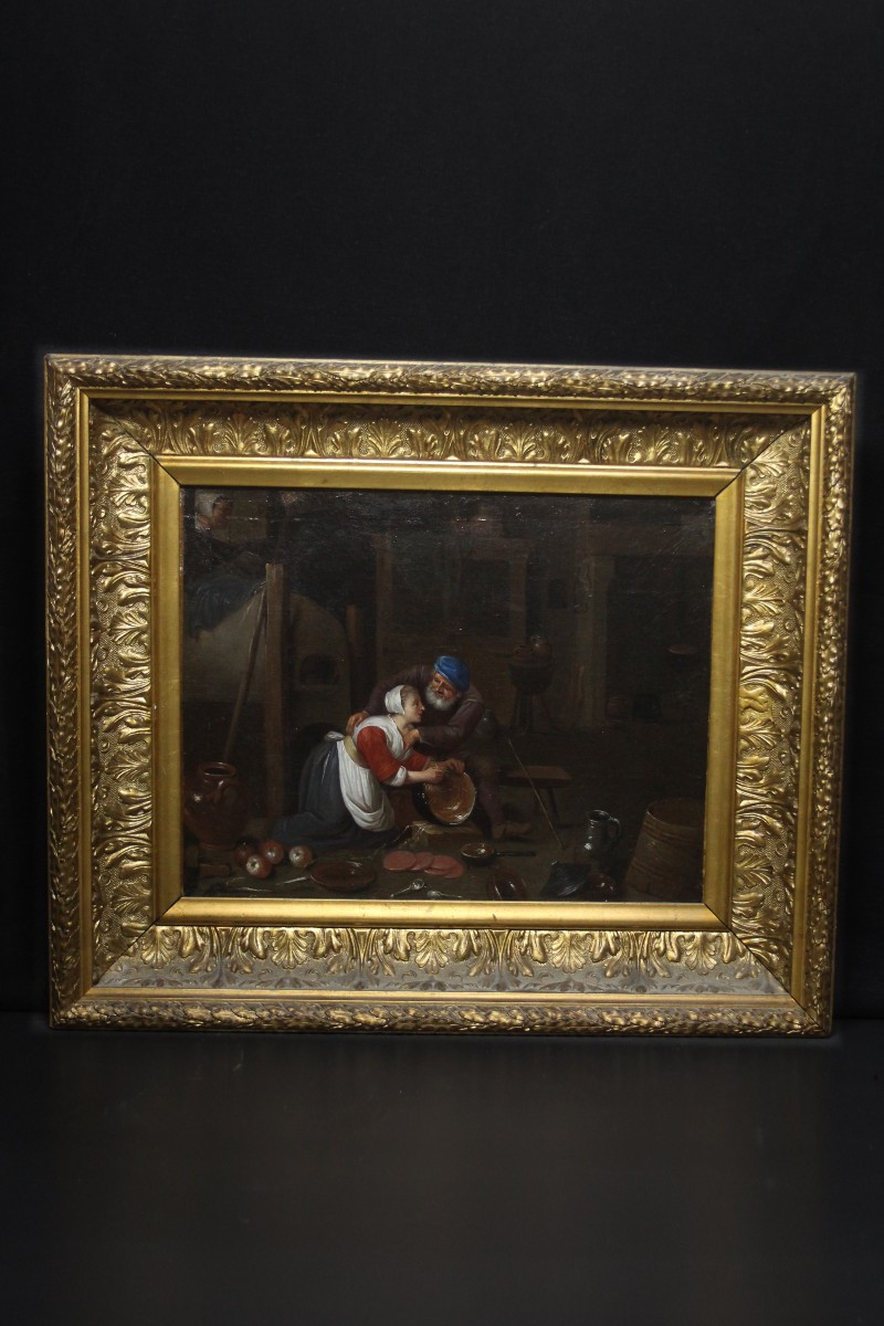 École flamande, intérieur de cuisine avec personnages