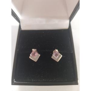 Pair Of Gold And Amethyst Stud Earrings