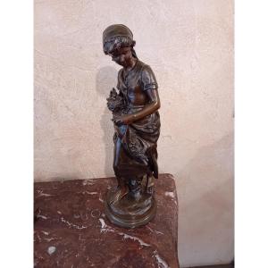 MATHURIN MOREAU BRONZE A PATINE BRUNE  FEMME A LA GERBE DE BLE ET AU NID D OISEAUX 