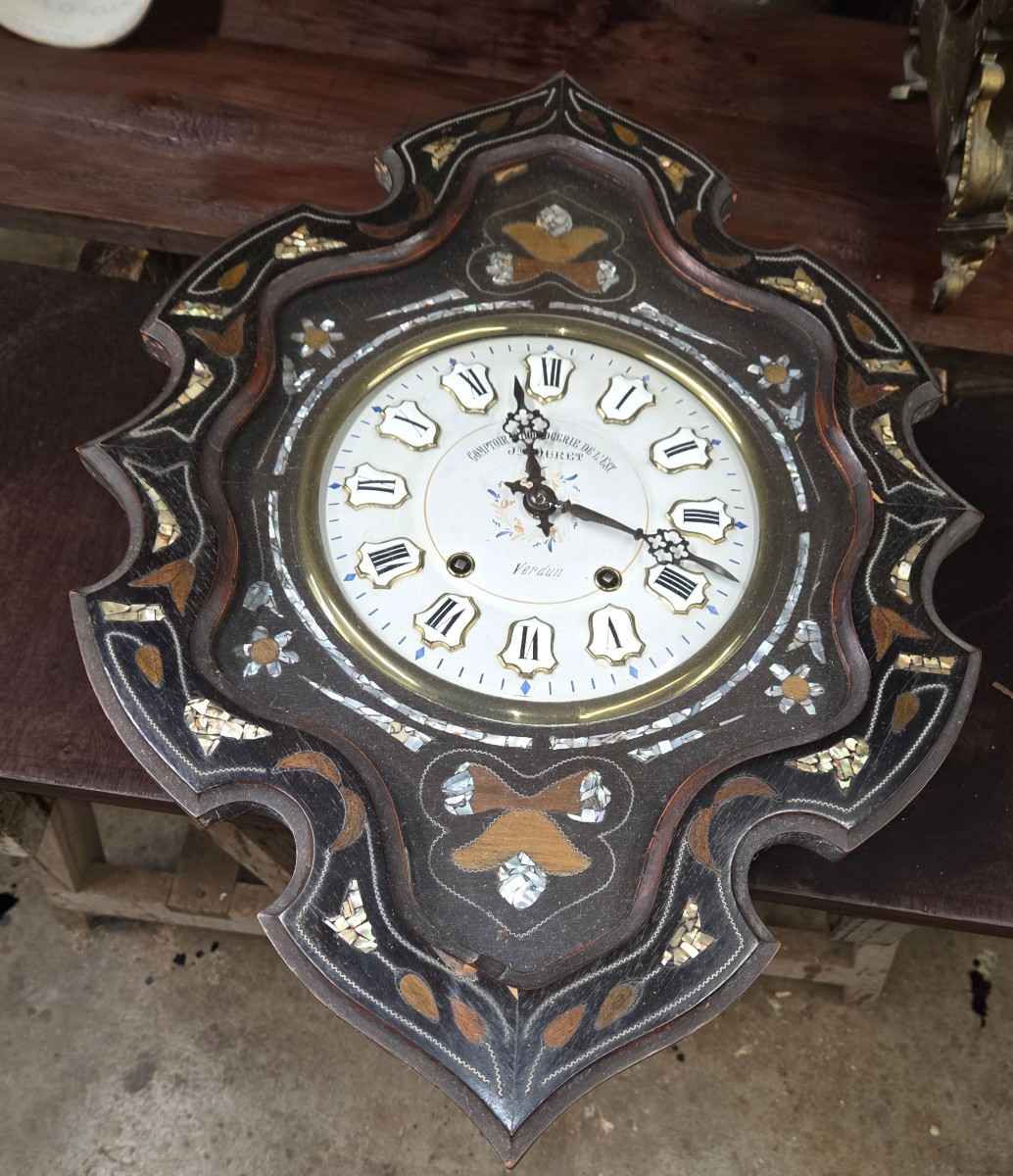 Pendule dit oeuil de beuf d'époque Napoléon III 