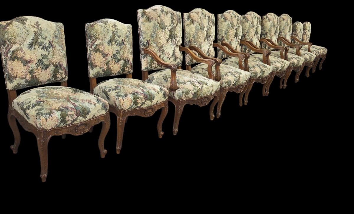 Important ensemble composé de 6 fauteuils et 4 chaises en noyer  estampillé de Honoré Dufin 